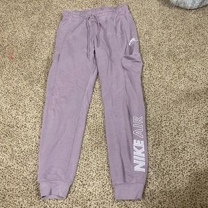 purple Nike sweatpants